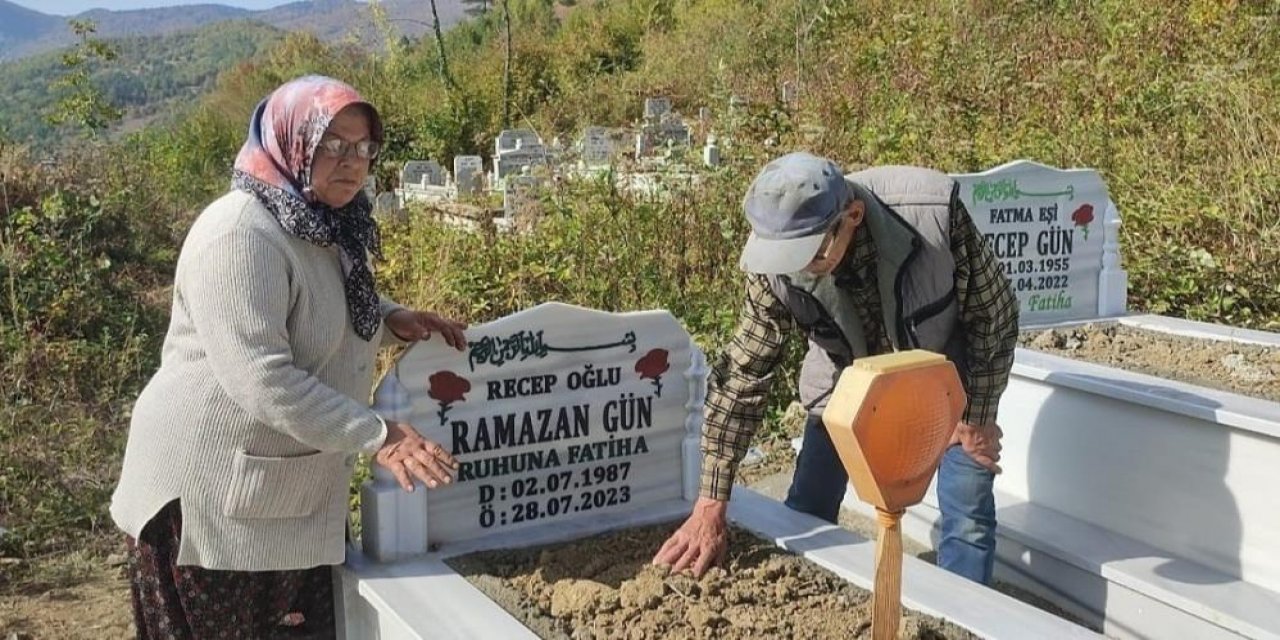 70 gün önce toprağa verdiği oğlunun mezarına gelen kadın hayatının şokunu yaşadı