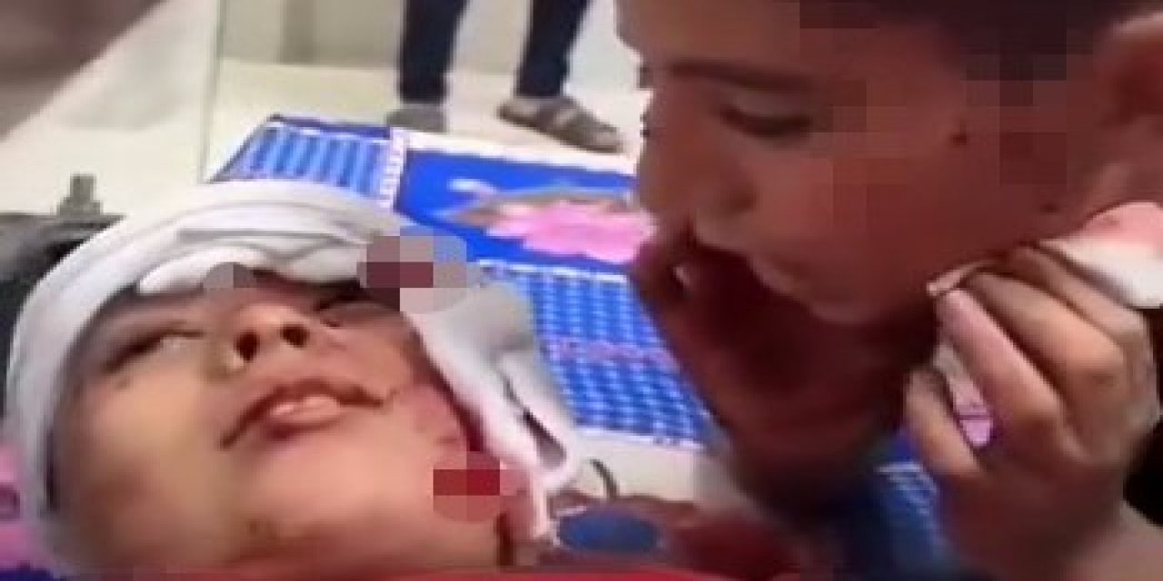 Filistinli bir çocuğun yaralı kardeşine şehadet getirmeyi öğrettiği görüntü yürek dağladı