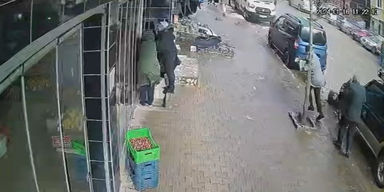 Şiddetli rüzgarda savruldu, ağaca tutunarak durabildi