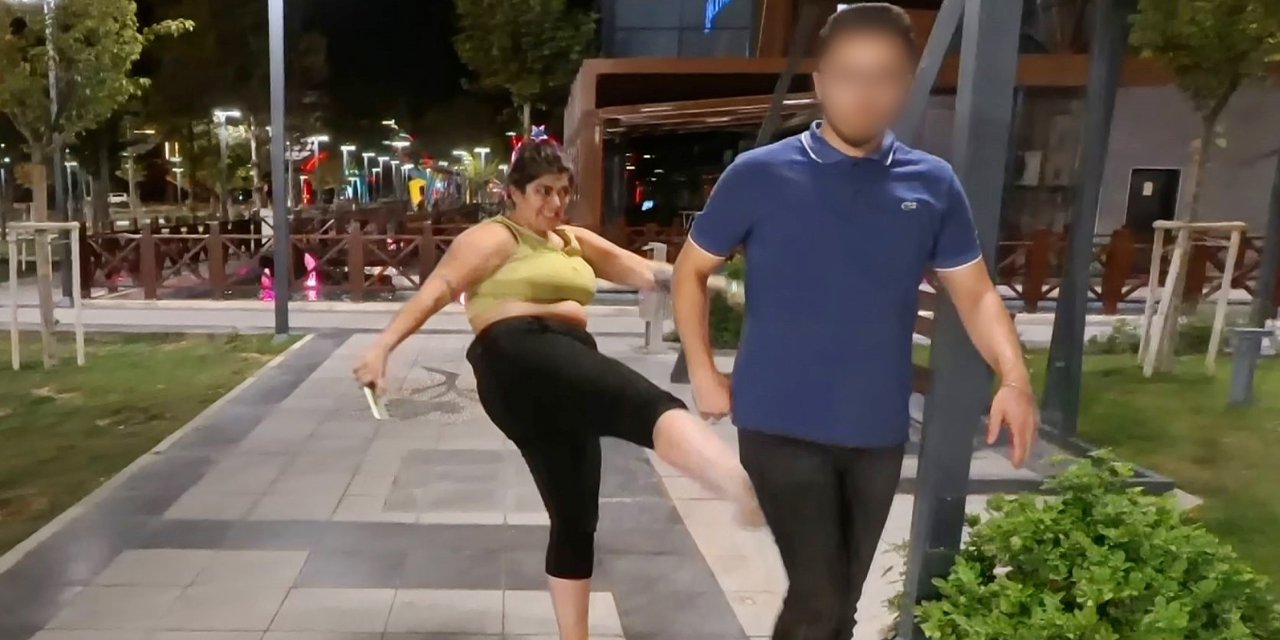 Çığlıklarıyla mahalleyi ayağa kaldırdı, yardıma gelenleri darbetti