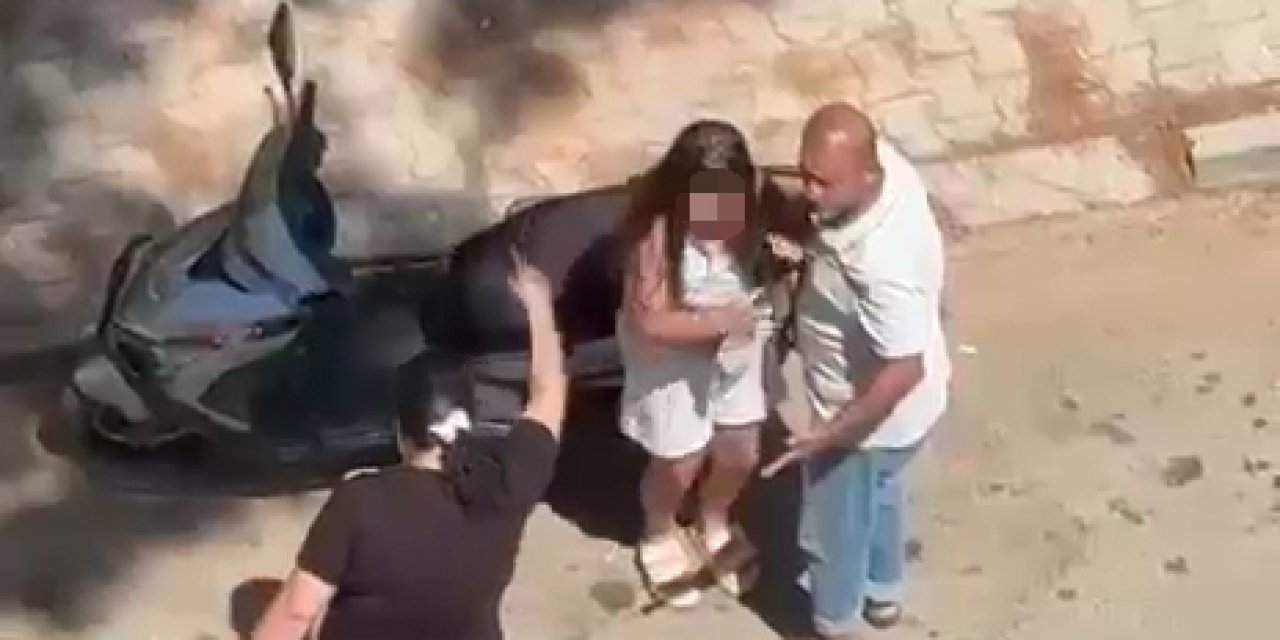 Sinir krizi geçiren kadın küçük kızını bıçakla kovaladı