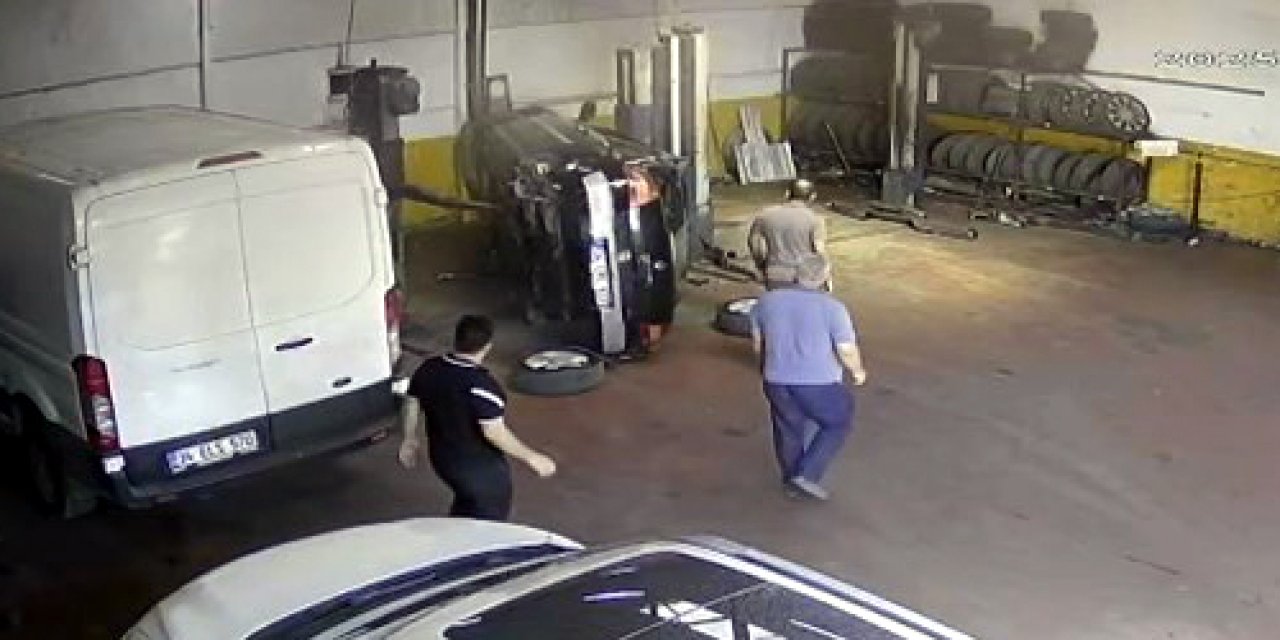 Sanayideki tamirhanede korkutan an! Otomobil liftten böyle düştü