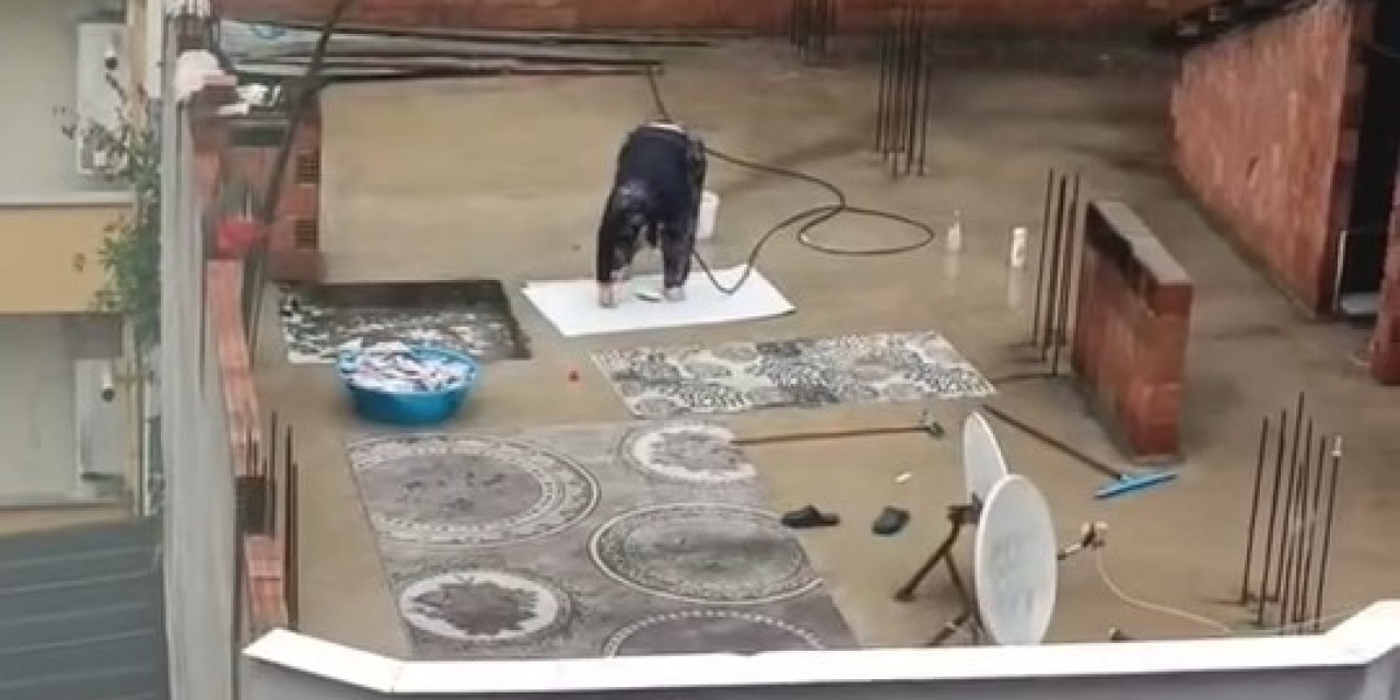 Boşalan barajlara aldırmadı! Yağmurlu havada halı yıkadı