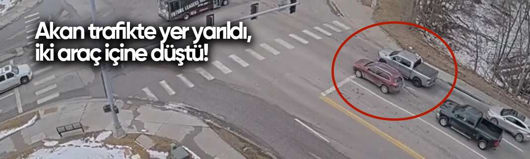 Akan trafikte yer yarıldı, iki araç içine düştü