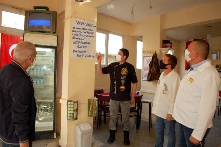 Kahvehaneci veresiyecileri koronalı duvar yazısı ile uyardı