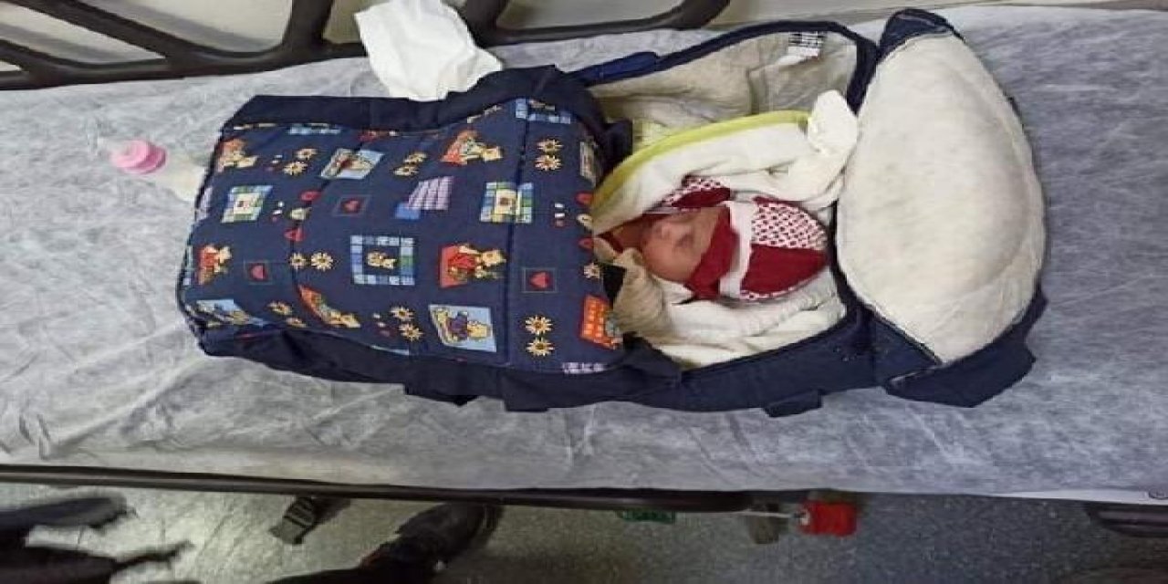 Yasakta sokağa çıkıp, 1 aylık bebeği apartman girişine terk etti