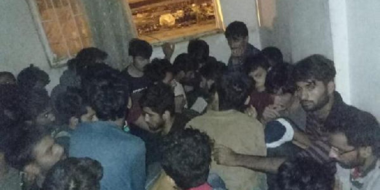 İki apartmana baskın yapan polis 115 Afgan göçmen yakaladı