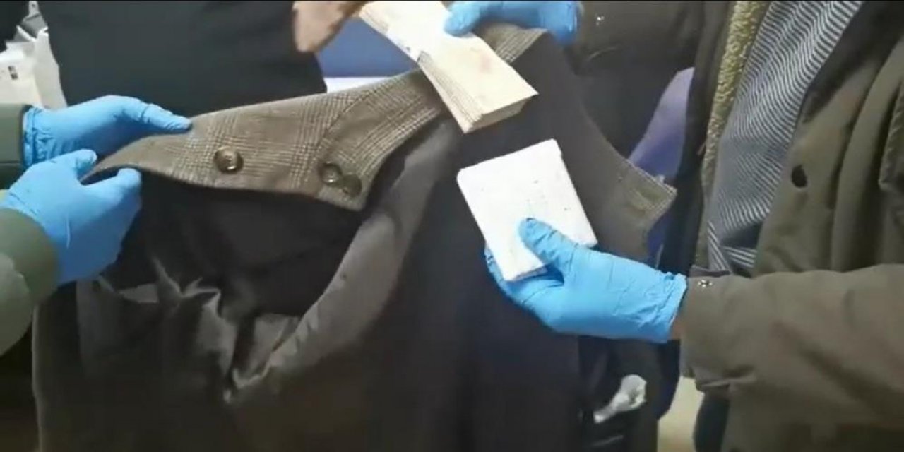 Tapu memurunun üzerinden deste deste para çıktı