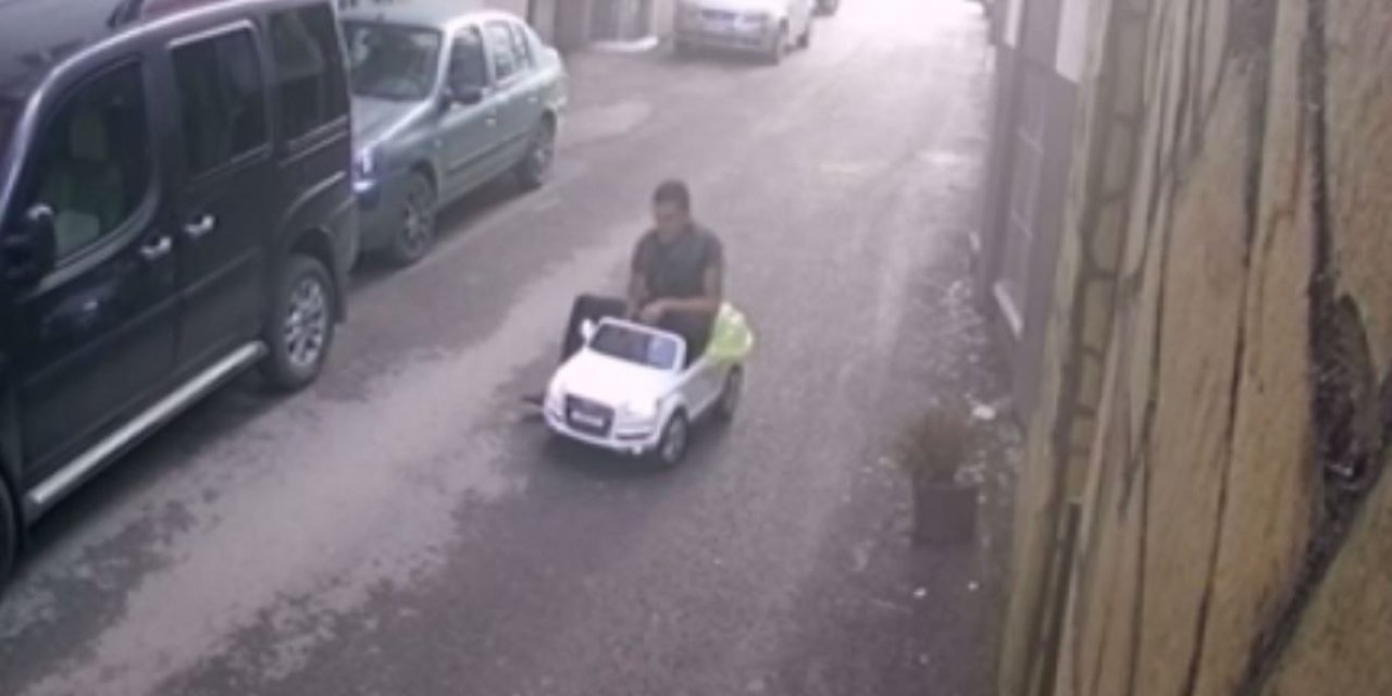 Akülü arabayı çaldı, taşıyamayınca sürerek uzaklaştı