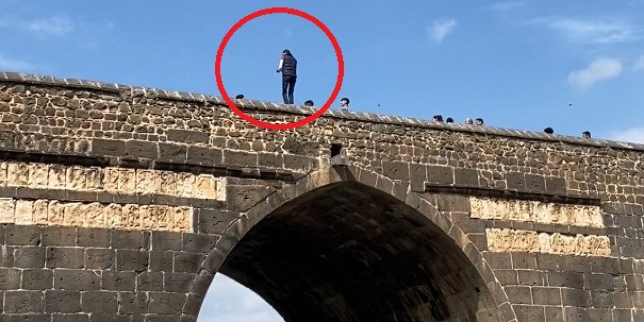 Tarihi köprünün kemerindeki kişiyi görenler telefona sarıldı