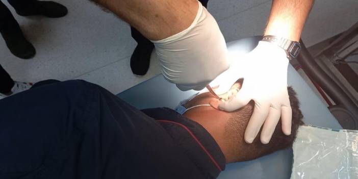 Kopya çekmek için kurduğu düzenek pes dedirtti: Maskesinde kamera, kulağında böcek!