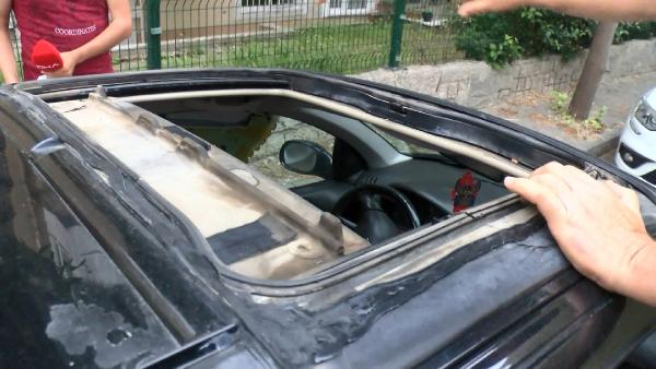 arabasinin-basina-gelmeyen-kalmadi-son-olayda-sunroof-calindi-002.jpg