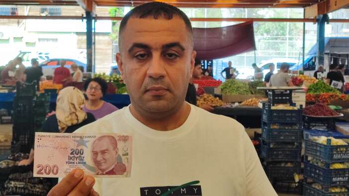 askini-ilan-etmek-icin-pazarda-300-bin-tl-dagitti